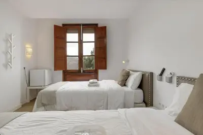 Cama o camas de una habitación en TeXeda Room Suites 4
