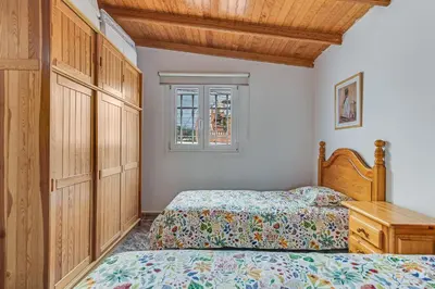 Cama o camas de una habitación en Home2Book Cozy Rural House with Terrace and Views