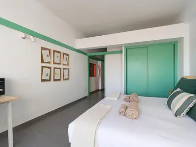Cama o camas de una habitación en Apartamento Playa 57