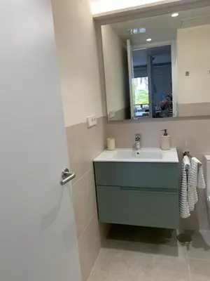 Un baño de Soleado y tranquilo apartamento