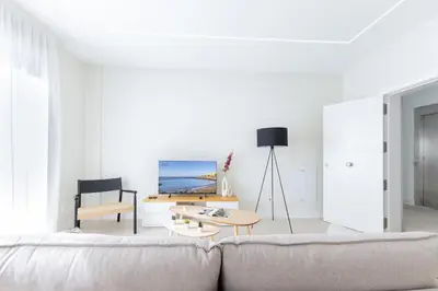 Zona de estar de Brisamar Suites by VillaGranCanaria