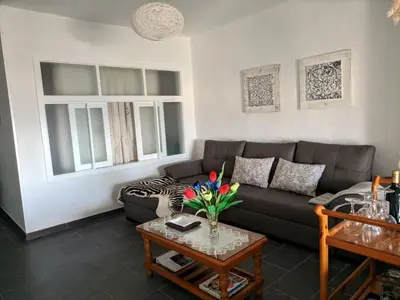 Zona de estar de Apartment Wohnung Faro de Sardina mit Blick aufs Wasser by Interhome