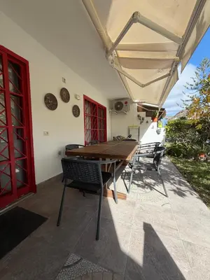 Plano de Cozy Garden by the Beach