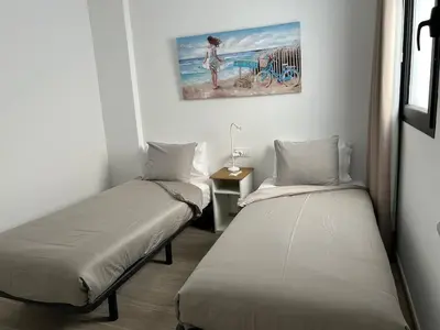 Cama o camas de una habitación en Arguineguín sol y playa