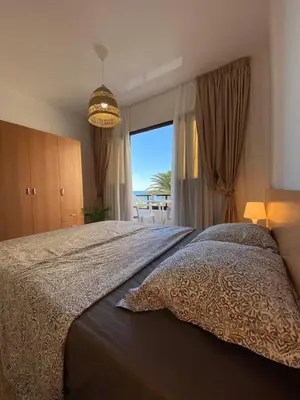 Cama o camas de una habitación en BEACH Arguineguin SEA VIEW 4