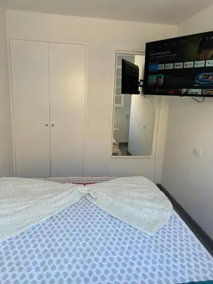 Cama o camas de una habitación en Luliche estudio