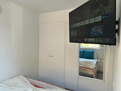 Cama o camas de una habitación en Luliche estudio