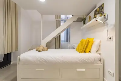 Cama o camas de una habitación en Apartment 100 m from Las Canteras - Shared Terrace