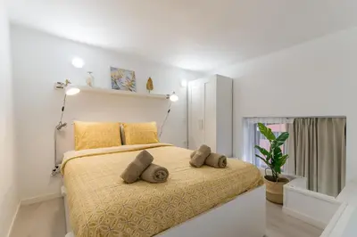 Cama o camas de una habitación en Apartment 100 m from Las Canteras - Shared Terrace
