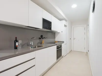 Una cocina o zona de cocina en Acogedor apartamento en Las Canteras