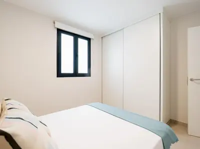 Cama o camas de una habitación en Acogedor apartamento en Las Canteras