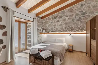 Cama o camas de una habitación en La Pelusa casa rural
