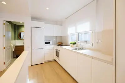 Una cocina o zona de cocina en Beachfront apartment in Las Canteras S4