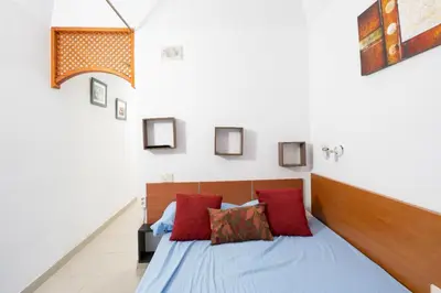 Cama o camas de una habitación en El Sueño Canario- Beach Front apartment in Las Canteras