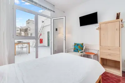 Cama o camas de una habitación en Home2Book Sunny Duplex with Private Terrace
