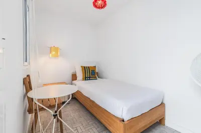 Cama o camas de una habitación en Home2Book Sunny Duplex with Private Terrace