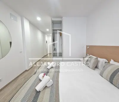 Cama o camas de una habitación en Elegance Canteras Suite