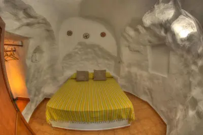 Cama o camas de una habitación en Cuevas De Barreto