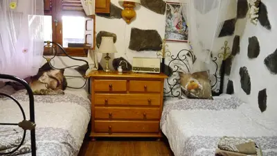 Cama o camas de una habitación en Casa Canaria Tejeda
