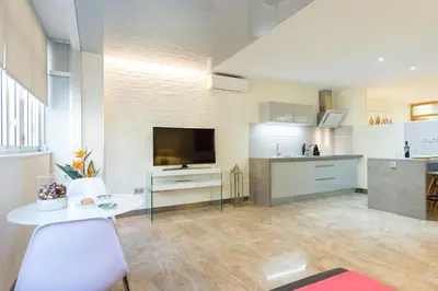 Una cocina o zona de cocina en Suites Garden Loft El Greco