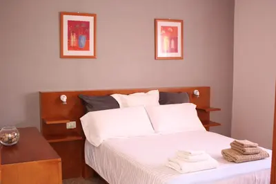Cama o camas de una habitación en Casa Carmela