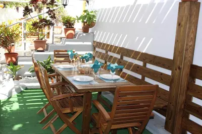 Un restaurante o sitio para comer en Casa Carmela