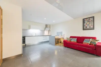 Zona de estar de Suites Garden Loft Velázquez