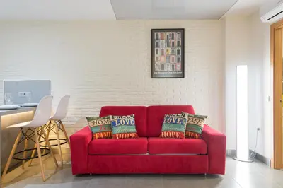 Zona de estar de Suites Garden Loft Velázquez