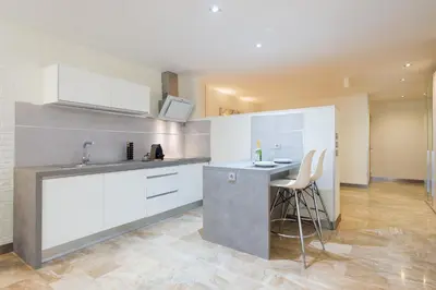 Una cocina o zona de cocina en Suites Garden Loft Picasso