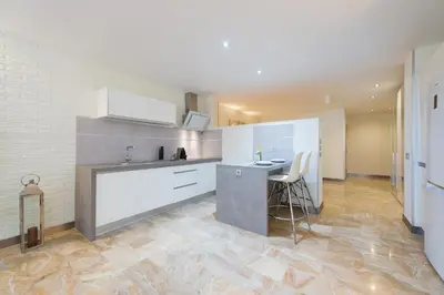 Una cocina o zona de cocina en Suites Garden Loft Picasso