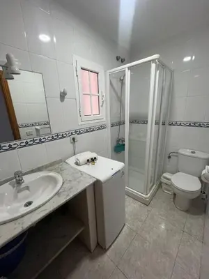 Un baño de Apartamentos Las Canteras Arena