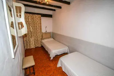 Cama o camas de una habitación en Los Arpones 5
