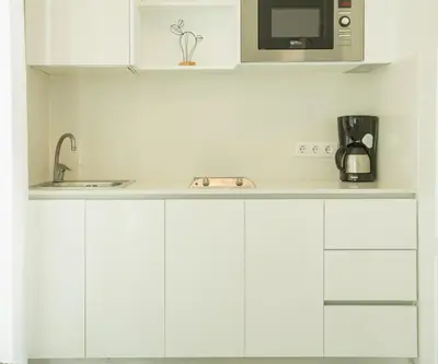 Una cocina o zona de cocina en Bungalows Doña Rosa