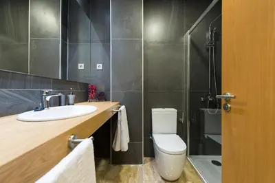 Un baño de Suites Garden Loft Munch