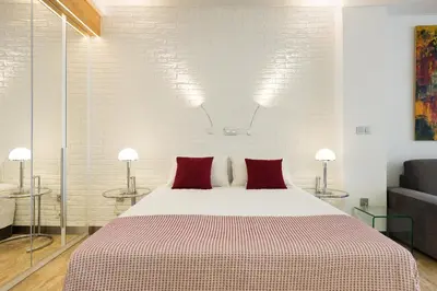 Cama o camas de una habitación en Suites Garden Loft Kandinsky