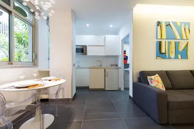 Una cocina o zona de cocina en Suites Garden Loft Miro