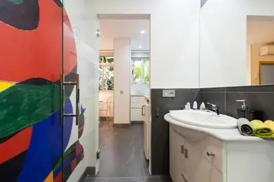 Una cocina o zona de cocina en Suites Garden Loft Miro