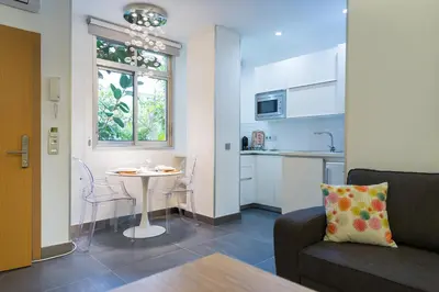 Una cocina o zona de cocina en Suites Garden Loft Miro