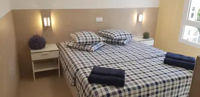 Cama o camas de una habitación en Stylish Apartment