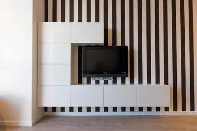 Una televisión o centro de entretenimiento en Virginia's Dream Panoramic Sea View Loft