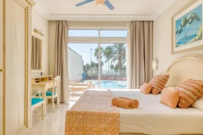 Cama o camas de una habitación en Holiday Club Playa Amadores