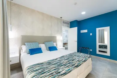 Cama o camas de una habitación en Holiday Club Playa Amadores