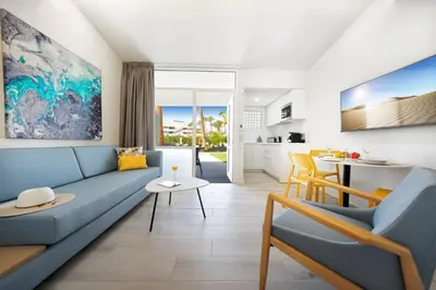 Zona de estar de Relaxia Los Girasoles Bungalows