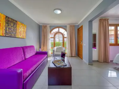 Zona de estar de eó Suite Hotel Jardin Dorado