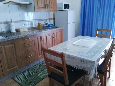 Una cocina o zona de cocina en Apartamentos el Motor Tejeda