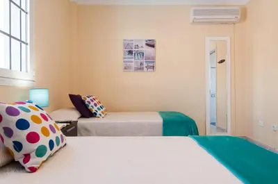 Cama o camas de una habitación en Sol y Mar El Salobre