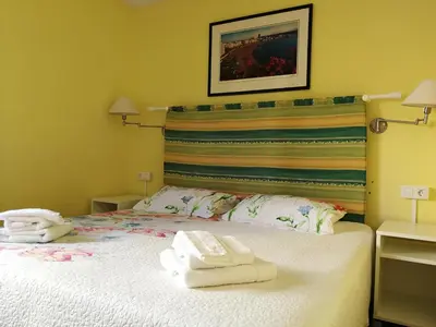 Cama o camas de una habitación en Apartamento PEPE Complejo LAS OLAS