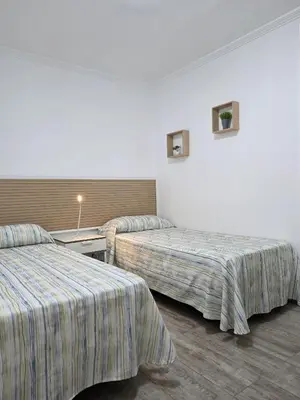 Cama o camas de una habitación en Bungalows Teresa