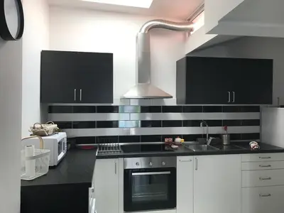 Una cocina o zona de cocina en Vista Faro 39