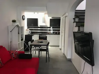 Una televisión o centro de entretenimiento en Vista Faro 39